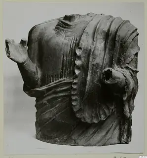 Terracotta figure fragment showing an upper body with stumps of two arms, from Mersinaki