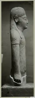 Limestone statue of a standing female figure in side profile, from Kition.