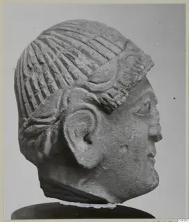 Limestone head sculpture from Mersinaki, shown in profile facing right