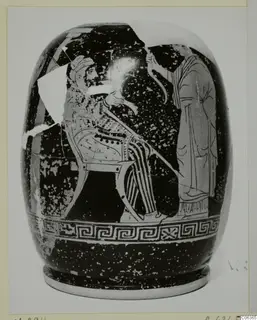 Painted vessel from Vouni with a seated bearded man and a standing draped figure on a dark ground, with a key-pattern border.