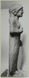 Limestone sculpture of a standing female figure in profile, from Vouni
