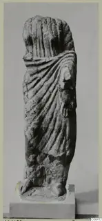 Limestone statue of a draped standing figure from Vouni, head missing