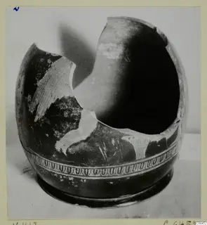 Broken pottery vessel with a band of looped pattern around the lower body, from Vouni