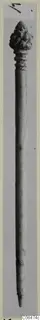 Long pin with a knobbed head and a tapering point