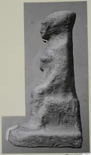 Terracotta figurine in profile facing left, standing on a flat base, from Vouni