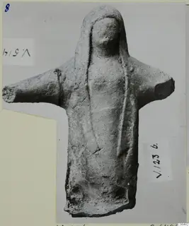 Terracotta figurine of a standing figure with arms stretched out to the sides, from Vouni