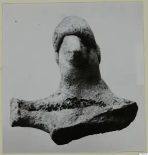 Terracotta figurine fragment from Vouni: head, neck and broad shoulders with a dark painted band