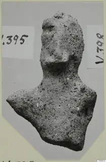 Terracotta figurine of a head and upper body with a broad nose, from Vouni