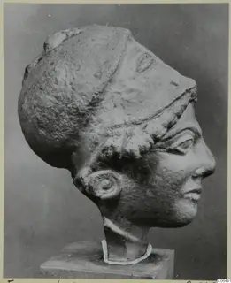 Limestone head from Vouni in profile on a square base, shown from a cast