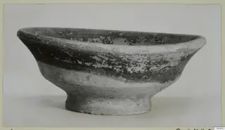 Cypro-Hell. I bowl, a shallow pottery bowl with a short foot, photographed from the side