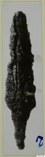 Corroded iron weapon, long and pointed, from Vouni