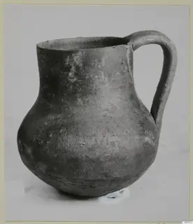 Coarse ware jug from Vouni with a single loop handle and a wide rounded body