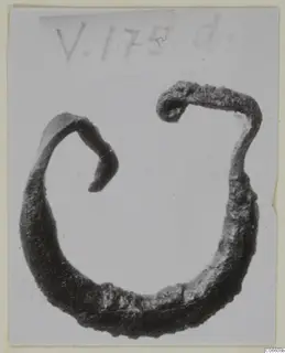 Corroded bronze staple-shaped fragment with two hooked ends, from Vouni