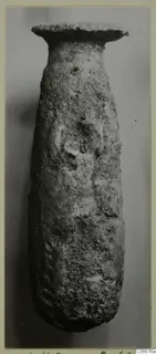 Alabaster vase with a tall body and a wide, flat rim, from Vouni
