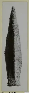 Long pointed metal blade with corroded surface, from Mersinaki
