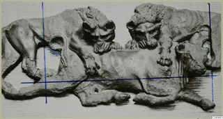 Bronze sculpture group of two lions attacking a bull.