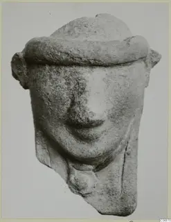 Terracotta Minor Plastic 2: figurine head with a thick rounded band across the top and protruding ears