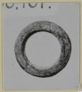 Bronze ring, a personal adornment from Soli, shown face-on against a pale background