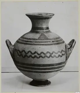 White Painted I amphora with two handles, dark painted bands and a band of wavy lines around the body