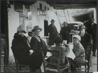Group at a table under a covered porch, lunch break in the village of Skarinou, Larnaca district