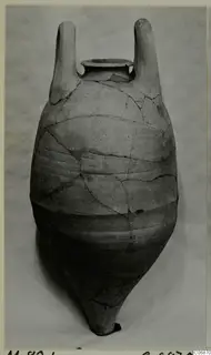 Pottery Plain White IV-V pithos from Marion, with two tall loop handles and a pointed base