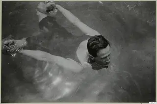 Einar Gjerstad swimming in water at Kyrenia, seen from above