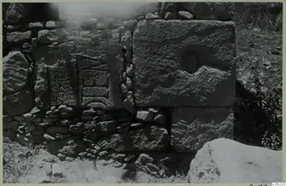 Stone wall of large squared blocks, with carved marks on one block, from Paphos and Pano-Paphos