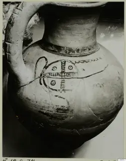 Bowl-jar of Levanto-Helladic Ware with a loop handle and dark painted motifs on its round body