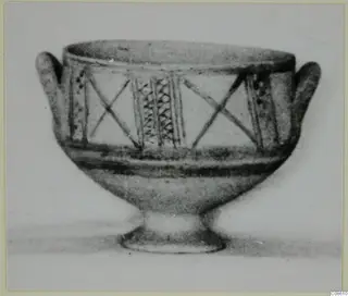 White Painted II bowl with two handles, decorated with crossed lines and vertical hatched panels, from Amathus.