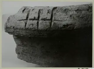 Close view of a pottery fragment with incised signs on its upper surface, Pottery Pithos Ware