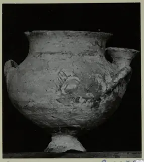 Pottery White Painted I bowl from Lapithos Markides, with two handles and a footed base