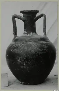 Two-handled dark pottery jar with a flared rim and a ridged band around the shoulder.