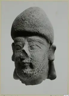 Terracotta head of a bearded figure with a tall cap, from Vasilika