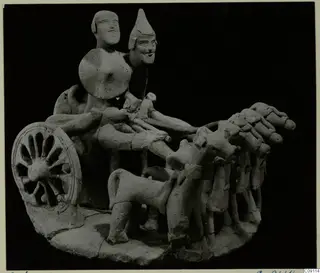 Terracotta model of a chariot with two figures and a team of horses, from Ayia Irini