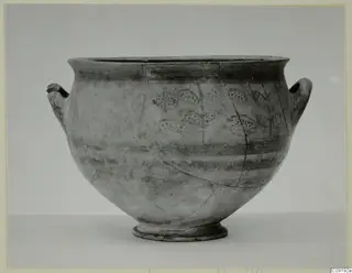 Levanto-Helladic bowl-jar with two small lug handles and painted dotted leaf motifs on stems