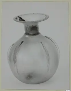 Blown glass unguentarium with a flaring rim and a ribbed, rounded body