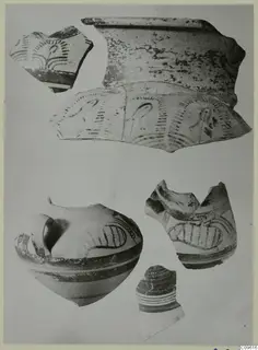 Levanto-Helladic sherds and a small handled vessel with painted bands and arc motifs