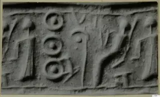 Glyptic: close view of a seal impression with three ring-and-dot motifs and linear figures