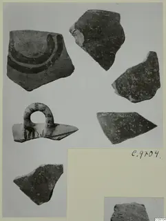 Lev. Hell. sherds: pottery fragments on a mount, one with dark curved bands and one a loop-handle piece with dark painted strokes