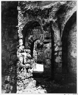 Ruined stone interior with pointed arches and walls of rubble masonry, Kyrenia Mountains