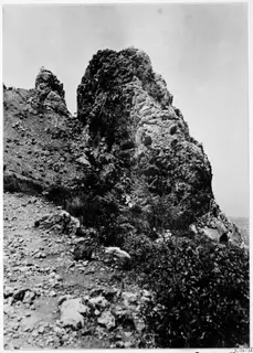 Rocky crag with scrub and loose stones on a hillside in the Kyrenia Mountains