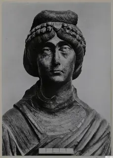 Roman stone sculpture of a head and draped shoulders, from Vienna