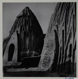 Conical mud huts with arched doorway and ridged walls, Musgum huts in Africa