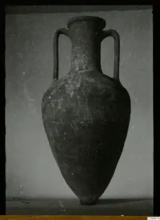 Two-handled amphora with a narrow neck and pointed base; find photograph from Ajii Omologitades, Politiko and Limassol Oasis.