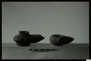 Two pottery vessels with pointed spouts side by side, with a scale bar, from Ajii Omologitades, Politiko and Limassol Oasis
