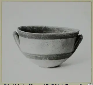 White Painted III-1 bowl with two handles and dark painted bands, shown against a plain background