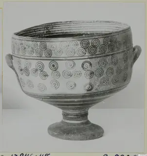 Footed bowl with two small side handles and bands of concentric-circle motifs, from Bichrome IV pottery
