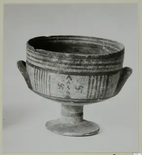 Pottery Bichrome III footed bowl with two small handles, painted bands and hooked cross and chevron motifs.