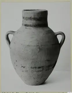 Two-handled pottery jar with dark painted bands on the neck and body