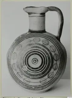 Jug with a round body painted with concentric circles and spirals, from the Pottery Bichrome IV group